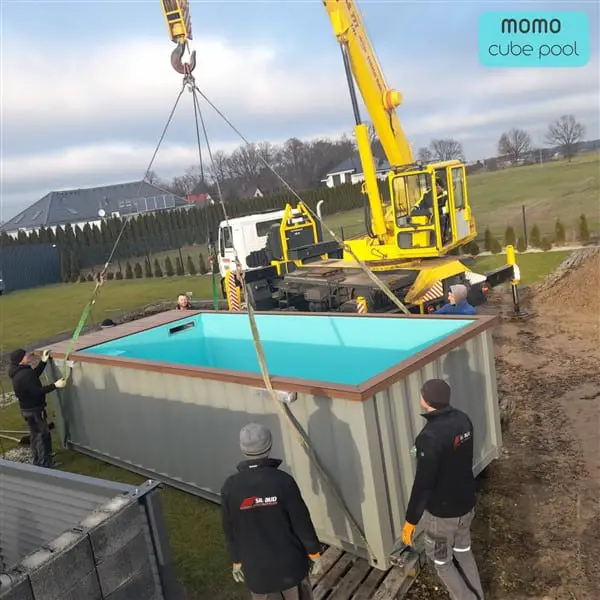 shipping container pool being installed