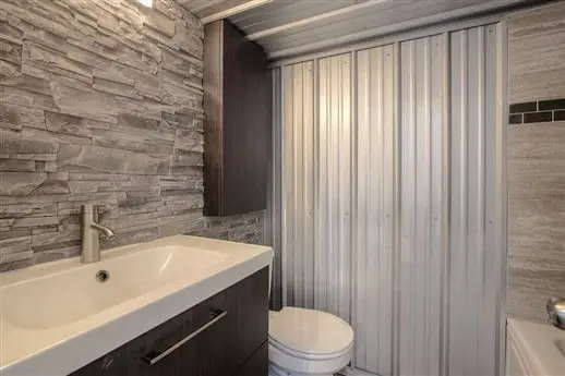 Bathroom of a one bedroom by Custom Container Living
