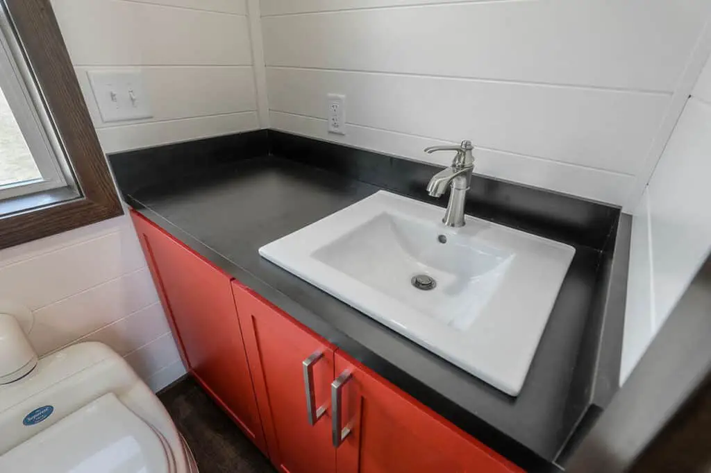 A beautiful modular home toilet and sink.