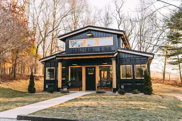 A container home with a big yard space