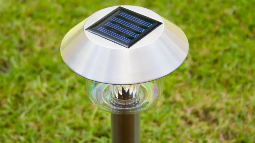 A garden lamp with a solar on top