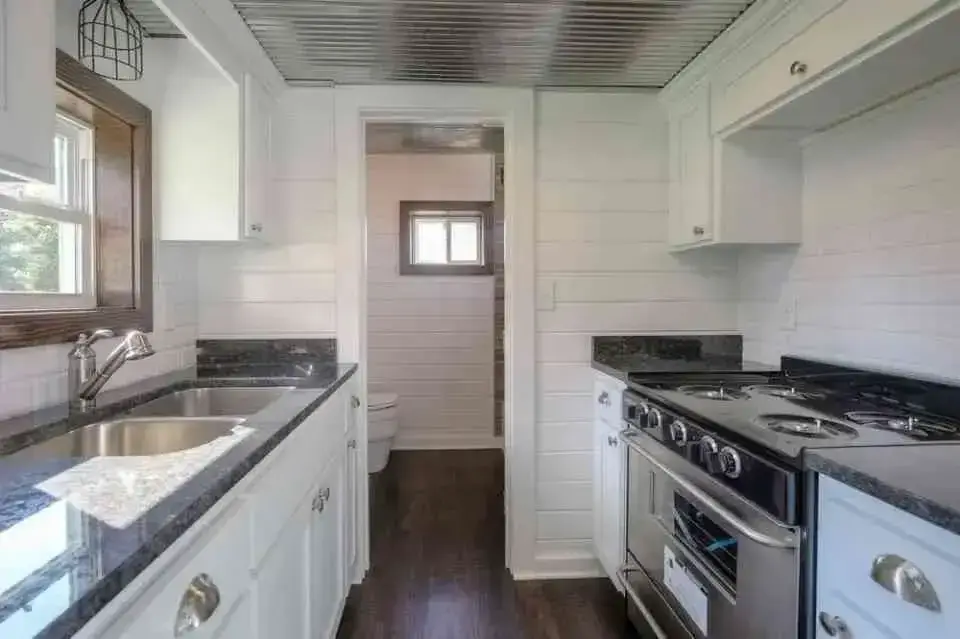 40 ft shipping container home by Lake Cabin kitchen