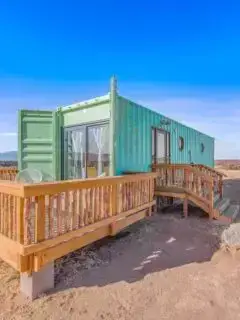 Exterior view of 40 shipping container homes in El Prado, New Mexico, United States