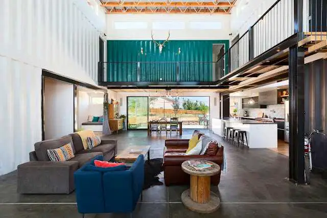 Living Room of 5-Bedroom Denver Shipping Container Home by BlueSky Studio