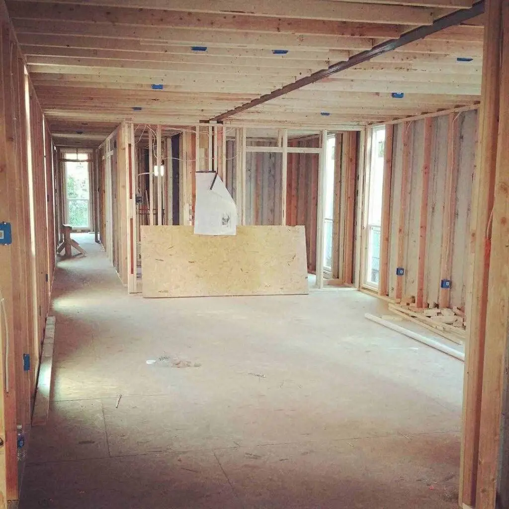 Working on the interior of container home in 2844 Dryades St, New Orleans construction process