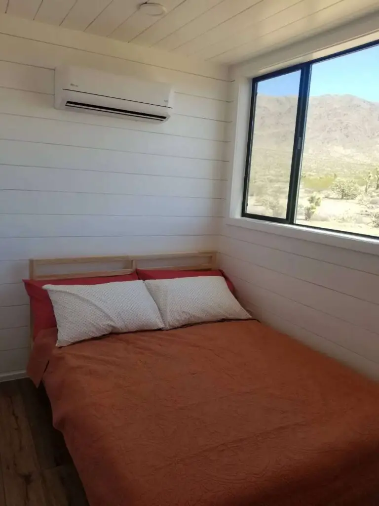 Bedroom of shipping container home in White hills, Arizona, United States