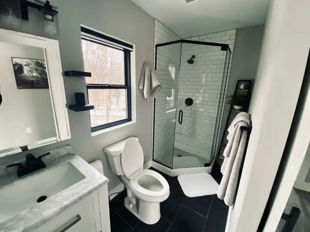 Full bathroom of a shipping container in Mancelona, Michigan, United States