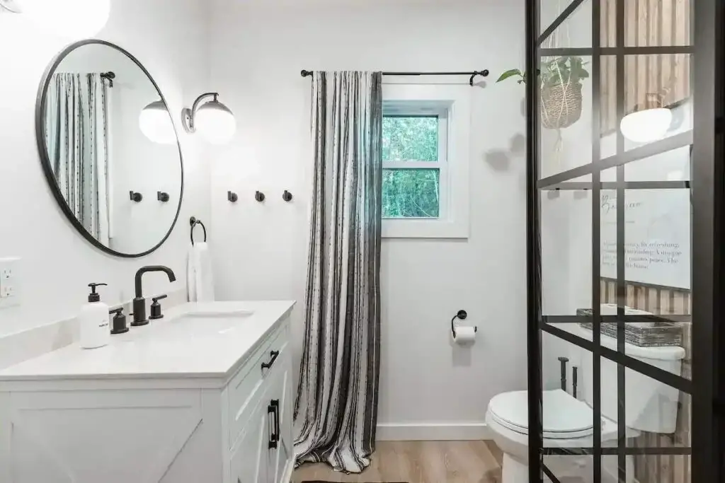Full bathroom of shipping container home in Columbus, North Carolina, United States