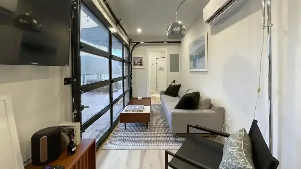 Living room of a shipping container home in Hurricane, West Virginia, United States