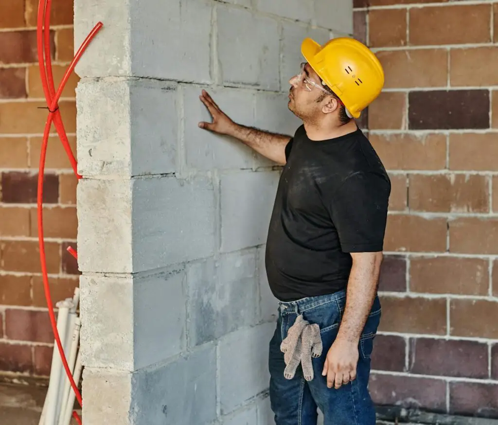 An inspector doing building inspection of West Auckland building